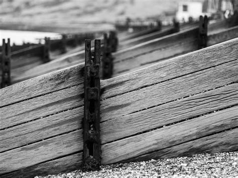 Wooden Fence | Wooden fence in a gravel beach leading to the… | Flickr