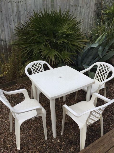 Garden plastic white table & 4 stackable chairs | in Torquay, Devon ...