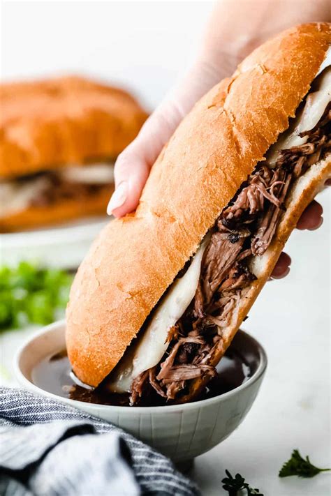 Slow Cooker French Dip Sandwiches (Melt in Your Mouth!!) | The Recipe Critic