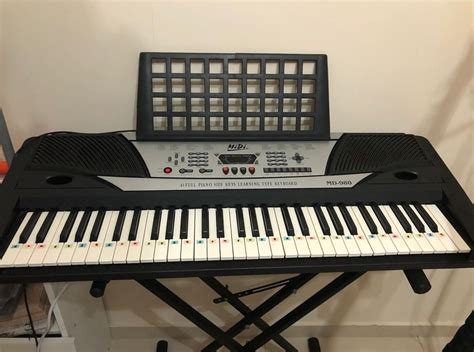 61-key keyboard + stand, Hobbies & Toys, Music & Media, Musical Instruments on Carousell