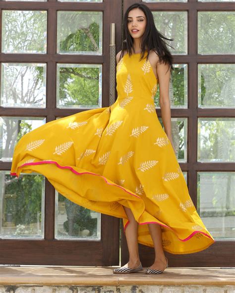 Mango yellow halter maxi dress by Ambraee | The Secret Label