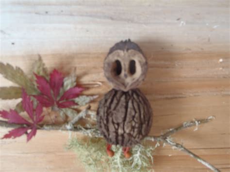 Black walnut shell owl made from 100% natural items. | Walnut shell crafts, Country wood crafts ...