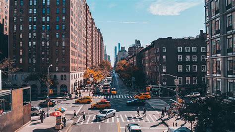 HD wallpaper: silver sedan, aerial view of street crossing in between buildings during daytime ...