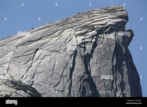 Hikers On An Amazing Cliff Stock Photo - Alamy