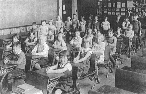 In the old days, students sat in desks that were bolted to the floor ... and they were taught to ...