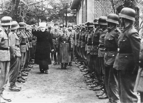 Amin al-Hosseini, the Grand Mufti of Jerusalem, reviewing Nazi Muslim Bosnian Troops. Bosnia ...