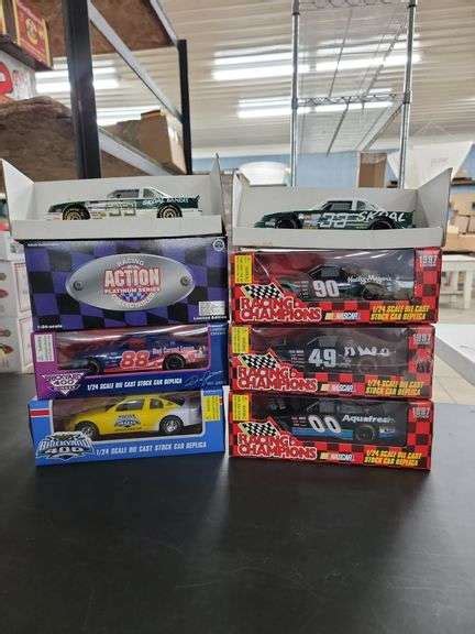 8 Die Cast Collectable Racing Cars - Baer Auctioneers - Realty, LLC