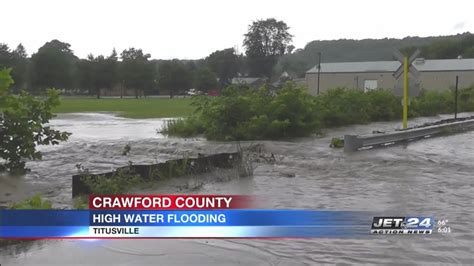 Crews in Titusville battle flooding from stormy weather - YouTube