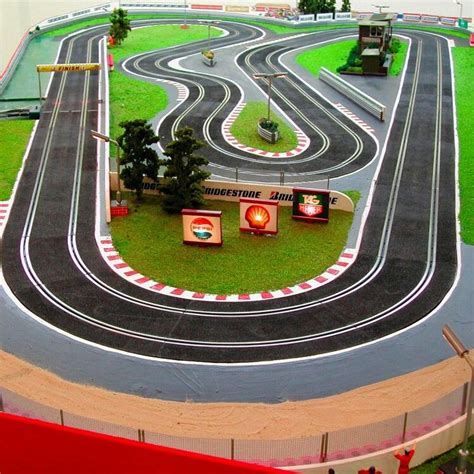 Scalextric. Had the biggest layout in the neighborhood. Dad clad the floor of the loft so that ...