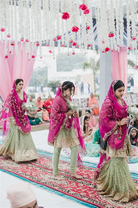 Gorgeous Sikh Wedding With A Custom Designed Bridal Lehenga | WedMeGood