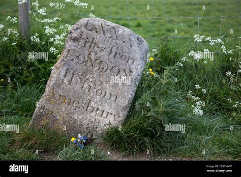 Old milestone at Stonehenge, UK. showing distance to London and ...