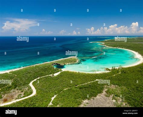 Aerial view of Dean's Blue Hole and beach landscape, Long Island ...