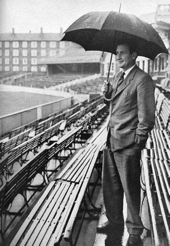 Jim Laker ruefully looks across The Oval as his benefit match is washed ...