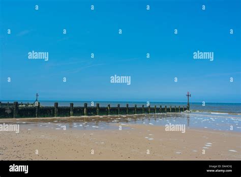 Walcott Beach with groyne, Norfolk Stock Photo - Alamy