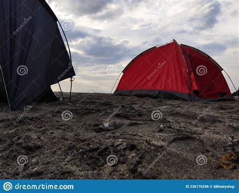 A Red Tent Set Up on a Stretch of Sand on the Beach in the Afternoon, Camping Activities To Fill ...