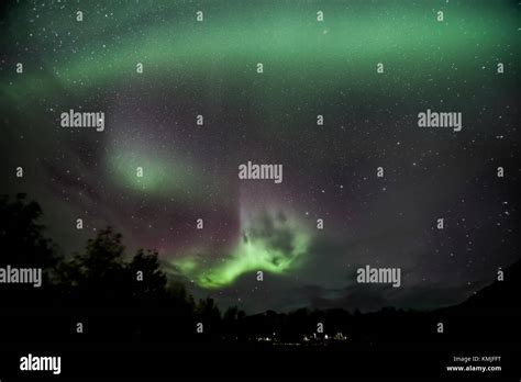 Northern Lights Shown over Akureyri Town, Iceland Stock Photo - Alamy