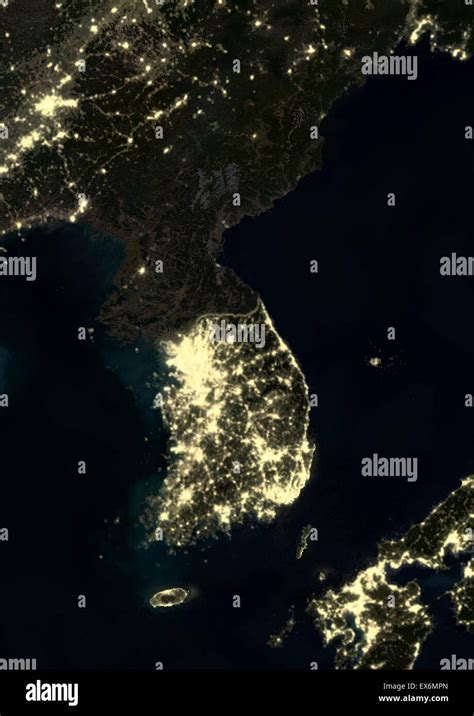 Korean Peninsula at night in 2012. This satellite image shows urban and ...