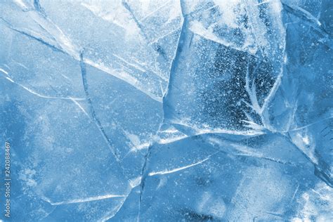 Abstract ice background. Blue background with cracks on the ice surface Stock Photo | Adobe Stock