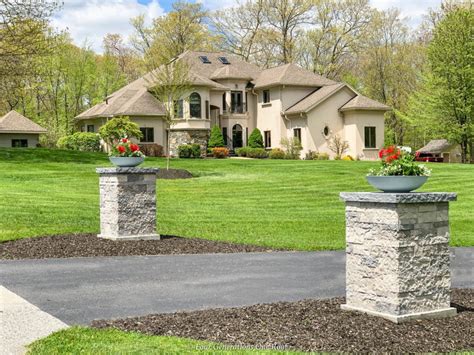 DIY driveway entrance stone columns | Four Generations One Roof