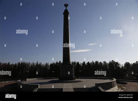 Monumental obelisk indicating the border between Europe and Asia in a forest near Ekaterinburg ...