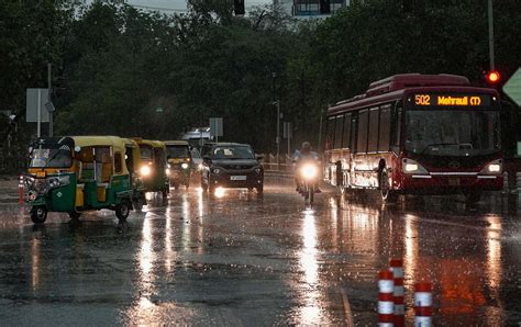 In Photos: Rain, strong winds hit Delhi, road traffic impacted