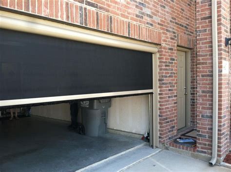 Motorized retractable screens to enclose a garage area. Use your garage to work on your car, and ...