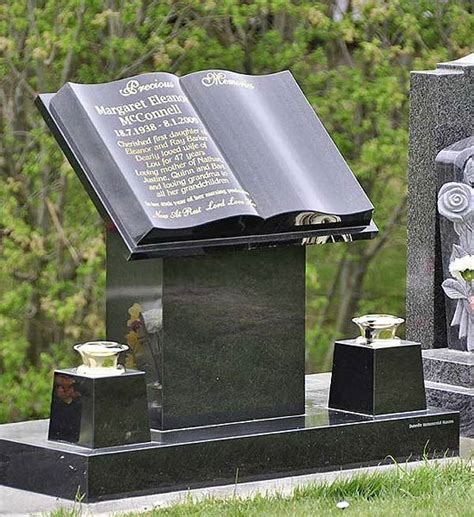 cemetery headstone/tombstone that resembles an open book on a pedestal ...