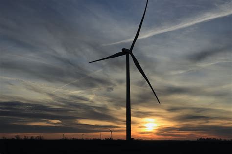 Silhouette of a Wind Turbine during Sunset · Free Stock Photo