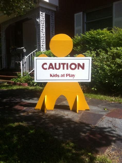 DIY Caution kids at play sign we made today to put out when the kids to play. #elliemacdesigns ...