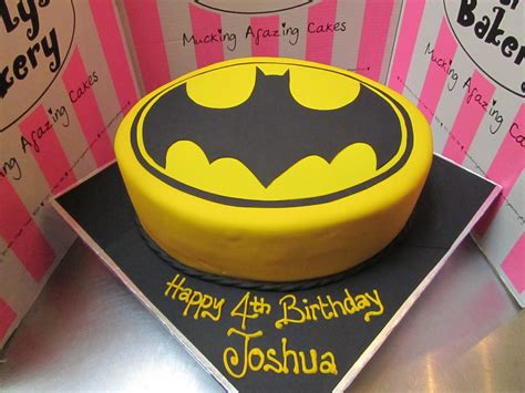 3D Batman logo shaped Wicked Chocolate cake covered in fon… | Flickr