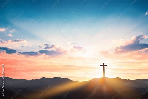 Silhouette cross on mountain sunset background Stock Photo | Adobe Stock