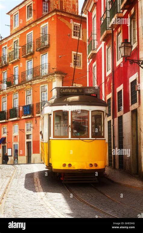 tram on narrow street of Alfama, Lisbon Stock Photo - Alamy