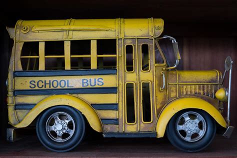 An old yellow school bus model 11045280 Stock Photo at Vecteezy