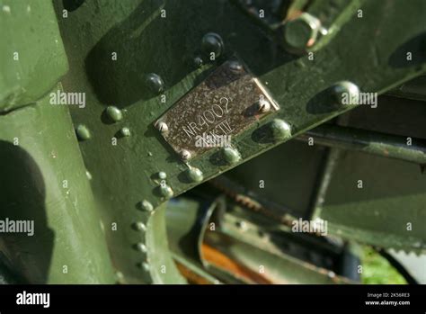 Metal plaque on an Anti-Aircraft Gun in Norway reading "NR 4002 MK IV" (Tueneset costal Fort ...