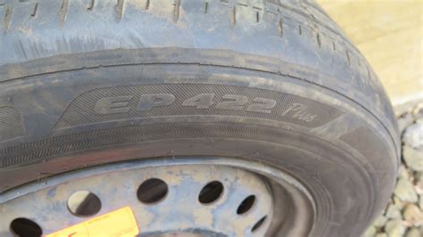 2-5x4.25x16 stock steel rims with 215/65R16 tires approx. 60% tread ...