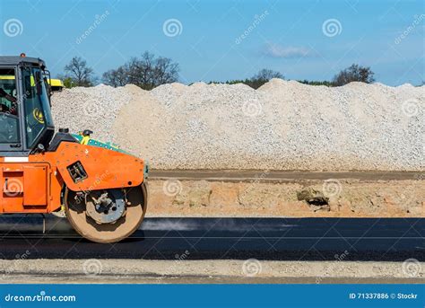 Road Roller Working on the Construction Site Stock Photo - Image of ...