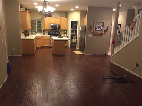 How can I secure / fasten a half installed floating engineered hardwood floor? - Home ...