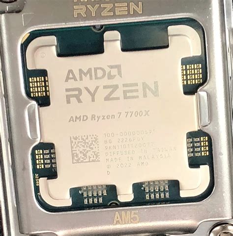 AMD Ryzen 7 7700X 8 Core Zen 4 Desktop CPU Smiles For The Camera