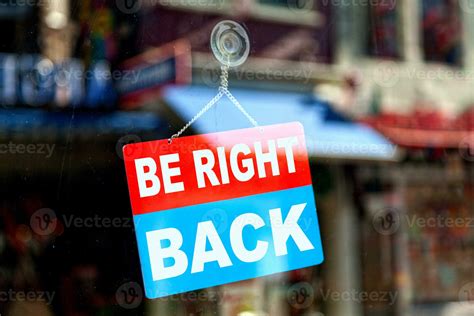 Be right back sign in a store window 24037910 Stock Photo at Vecteezy