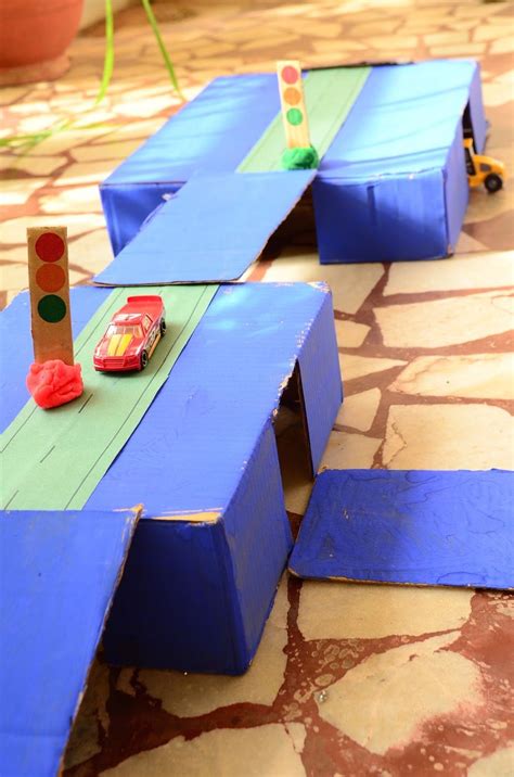 DIY Tunnel & Ramps for Toy Cars | Diy toys car, Art activities for toddlers, Fun activities for kids