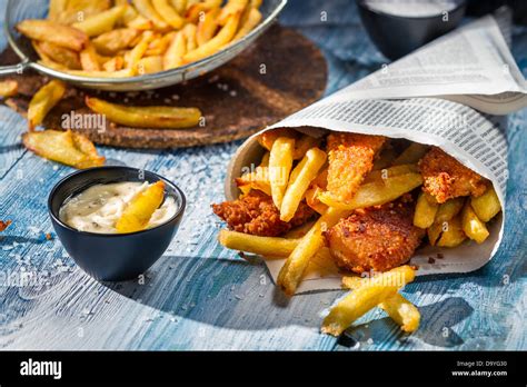 Homemade Fish & Chips and sauce Stock Photo - Alamy