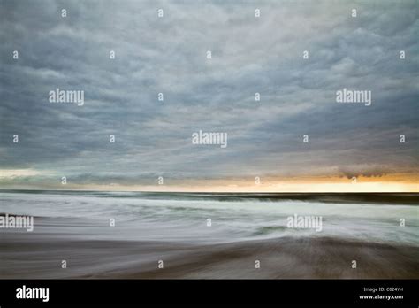 Sunrise over Indian Ocean long exposure Stock Photo - Alamy