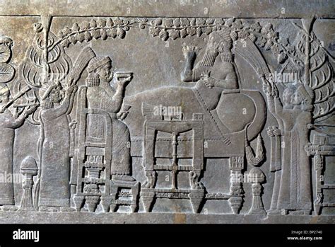 ASSYRIAN KING ASHURBANIPAL & HIS QUEEN FEASTING IN THEIR COURT IN ...