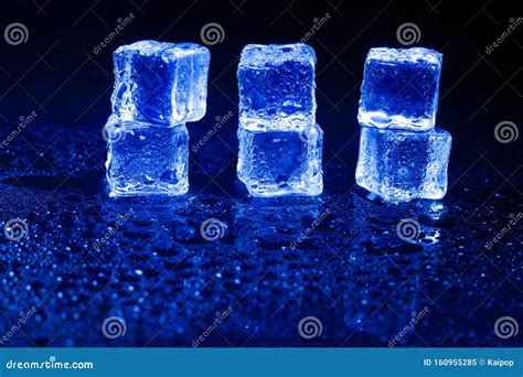 Blue Ice Cubes on Black Background Stock Image - Image of rocks, background: 160955285