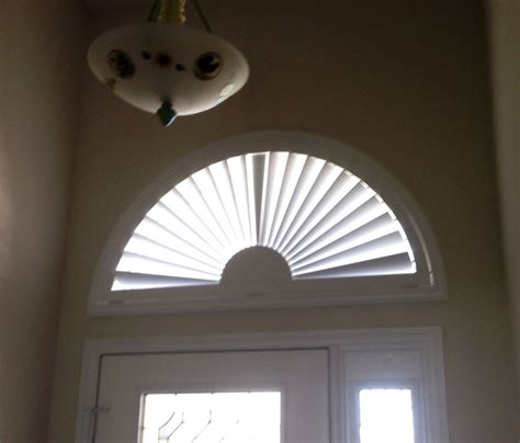 Arch sunburst shutter panel with adjustable louvers. Available at Budget Blinds | Budget blinds ...