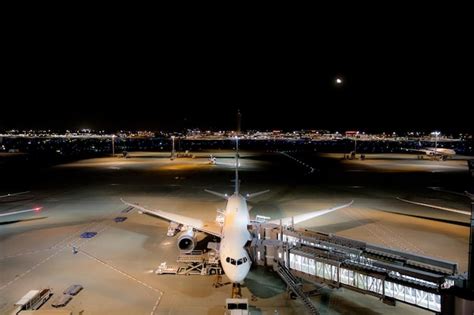 Premium Photo | High angle view of airplane on haneda airport at night