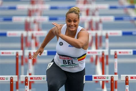 Shot Put Champion Runs 100M Hurdles To Keep Team In Competition | Essence