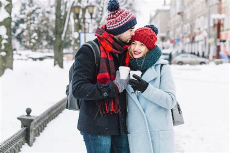 Free Photo | Loving couple walking in winter city