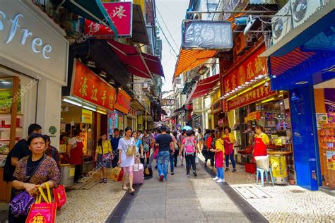 MACAU, CHINA- MAY 11, 2017: An unidentified people walking in the ...