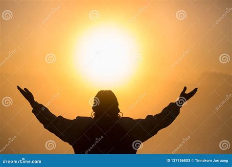 Man Praying at Sunset Mountains Raised Hands Travel Lifestyle Spiritual ...